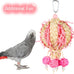 Bird foraging shredder hanging toy with bell for parakeet, parrot, conure, cockatiel, and lovebird birds, pink, 1 pack