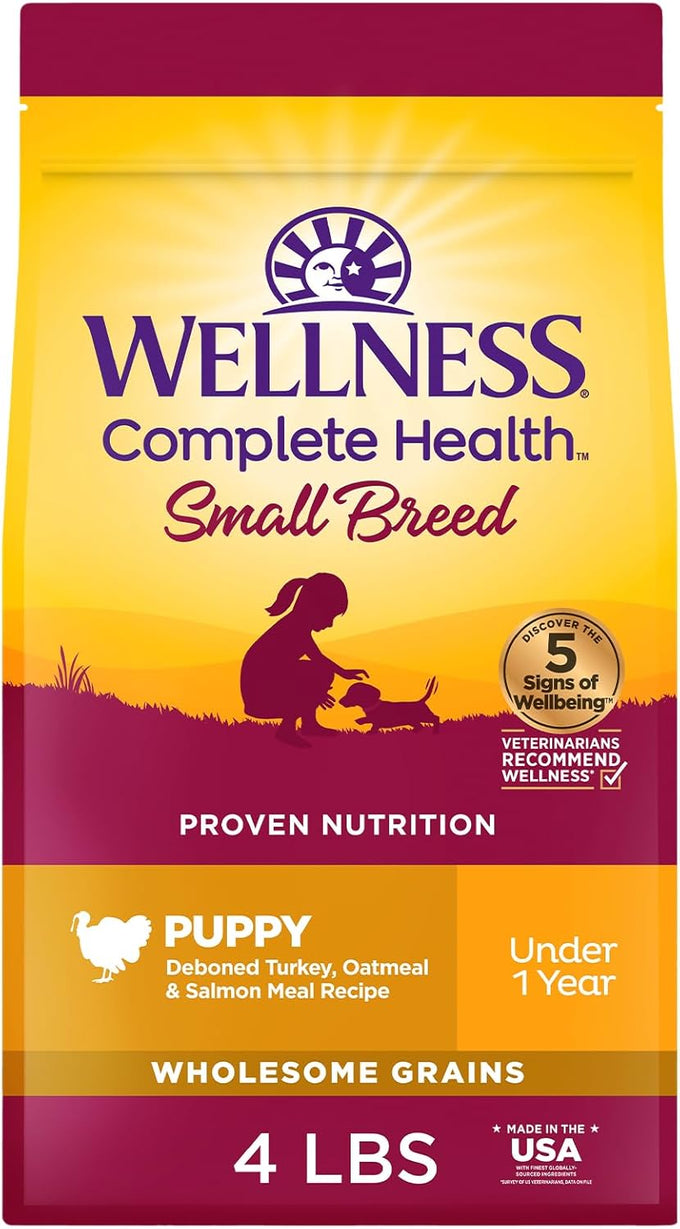 Wellness Complete Health small breed puppy dry dog food in 4 lb bag, wholesome grain kibble, natural, turkey, oatmeal, and salmon recipe